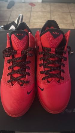 Red and Black Nike LeBron 19 with gold
