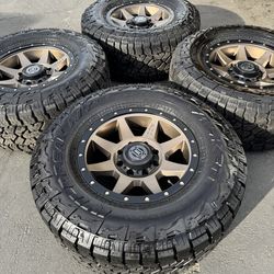 New 8x180 GMC Sierra Chevy Silverado 2500 18” Icon Wheels and 35” Falken WildPeak AT4W Tires 8 Lug