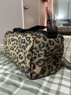 Supreme leopard duffle bag hotsell