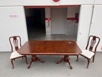 Solid Wood Dining Table  with expansion piece + 2 cushioned chairs. Delivery Available.