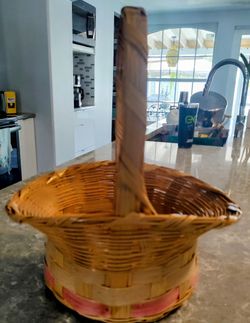 Basket with a handle width 12 1/2 inches X 14 inches height X 3 1/2 depth