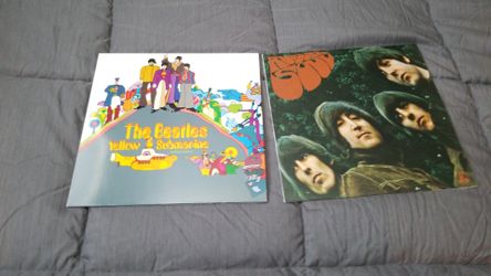 Brand new Beatles records no scratches they are open