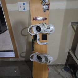 Burton snowboard and Ogio snowboard bag