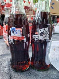 2 different Coca Cola convention polar bear bottles