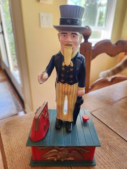 Vintage 1975 plastic Uncle Sam mechanical coin Bank
