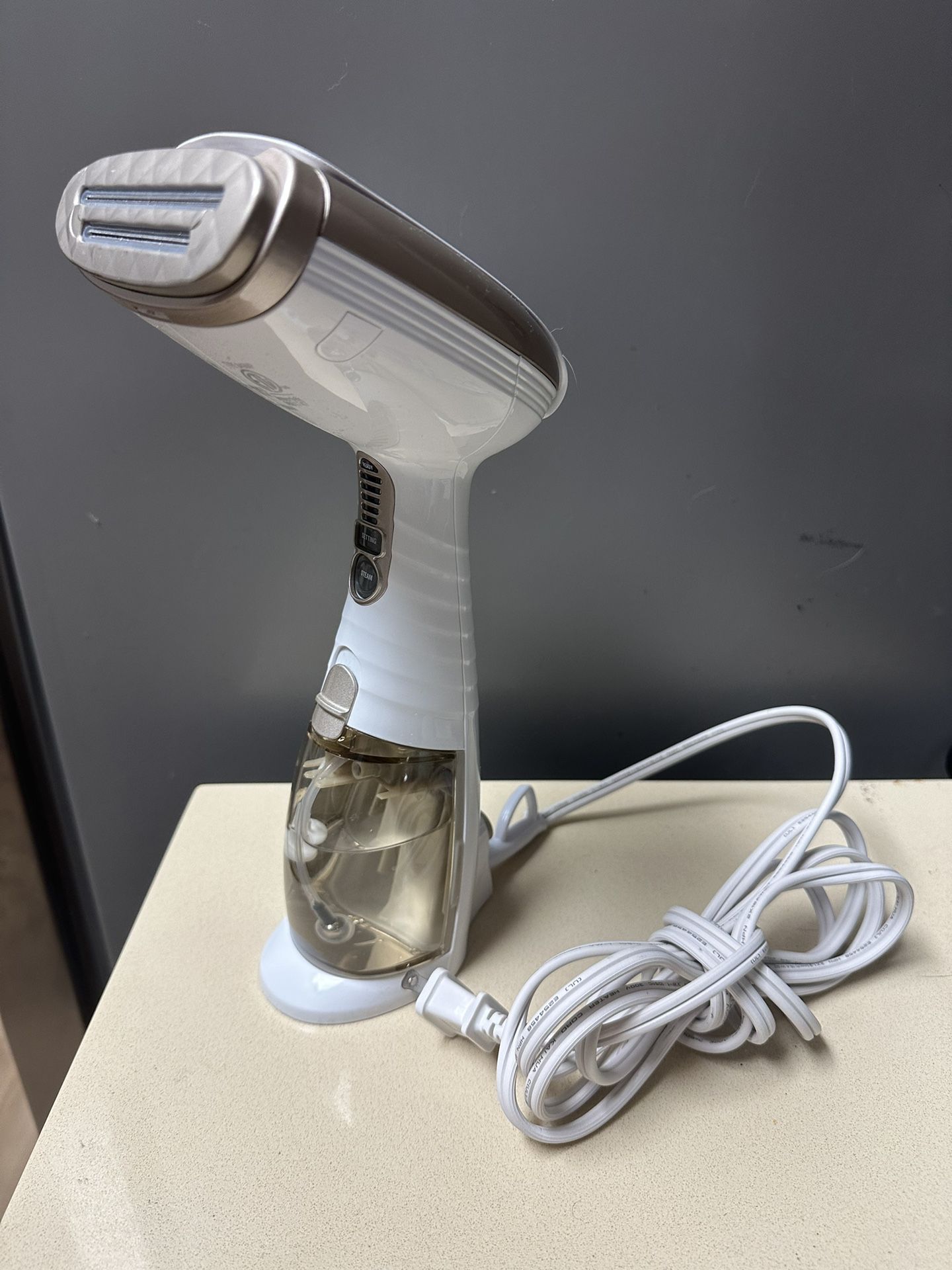 Conair Handheld Garment Steamer for Clothes, Turbo ExtremeSteam 1875W, Portable Handheld Design, Strong Penetrating Steam, White