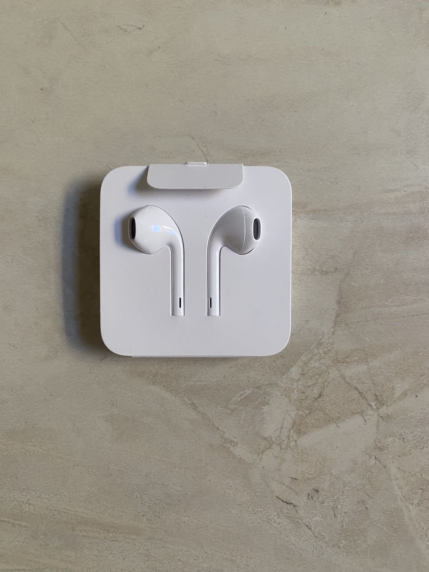 Apple Earbuds with Lightning Connection works with iPhone & iPad