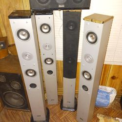 4 Tower Speakers And 1 Small Center Speaker