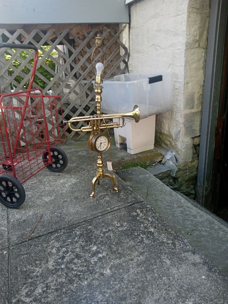 Handmade Trumpet Clock 100$