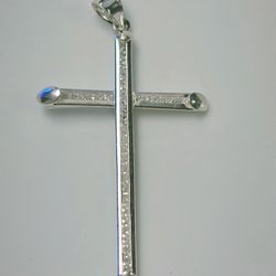 Silver cross with beautiful white zircons. 