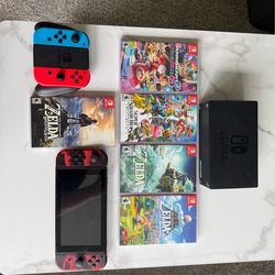 Nintendo Switch  + extra controller + 5 games
