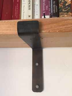 Industrial shelving brackets for open shelving