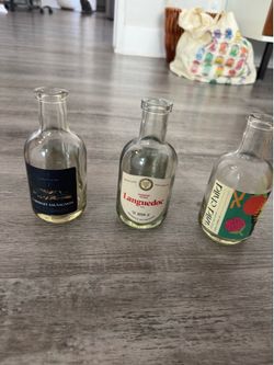 Mini wine bottles (~15)