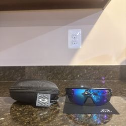 Blue Oakley Sunglasses