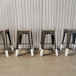 Brand New Heavy Duty Indoor-Outdoor 24 Inches Metal Stackable High Backless Bar Counter Stools set of 4 Gun color.   Brand New in Original packaging. 