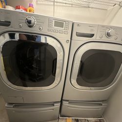 Lg Washer and Dryer set with pedestal storage drawer