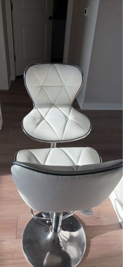 Two White Chairs