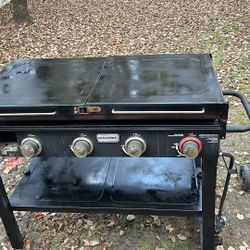 Flat top four burner propane grill