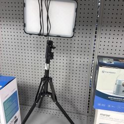 LED photography light panel on a tripod stand. 