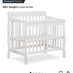 Mini Crib 4-in-1 Convertible + Changing Table