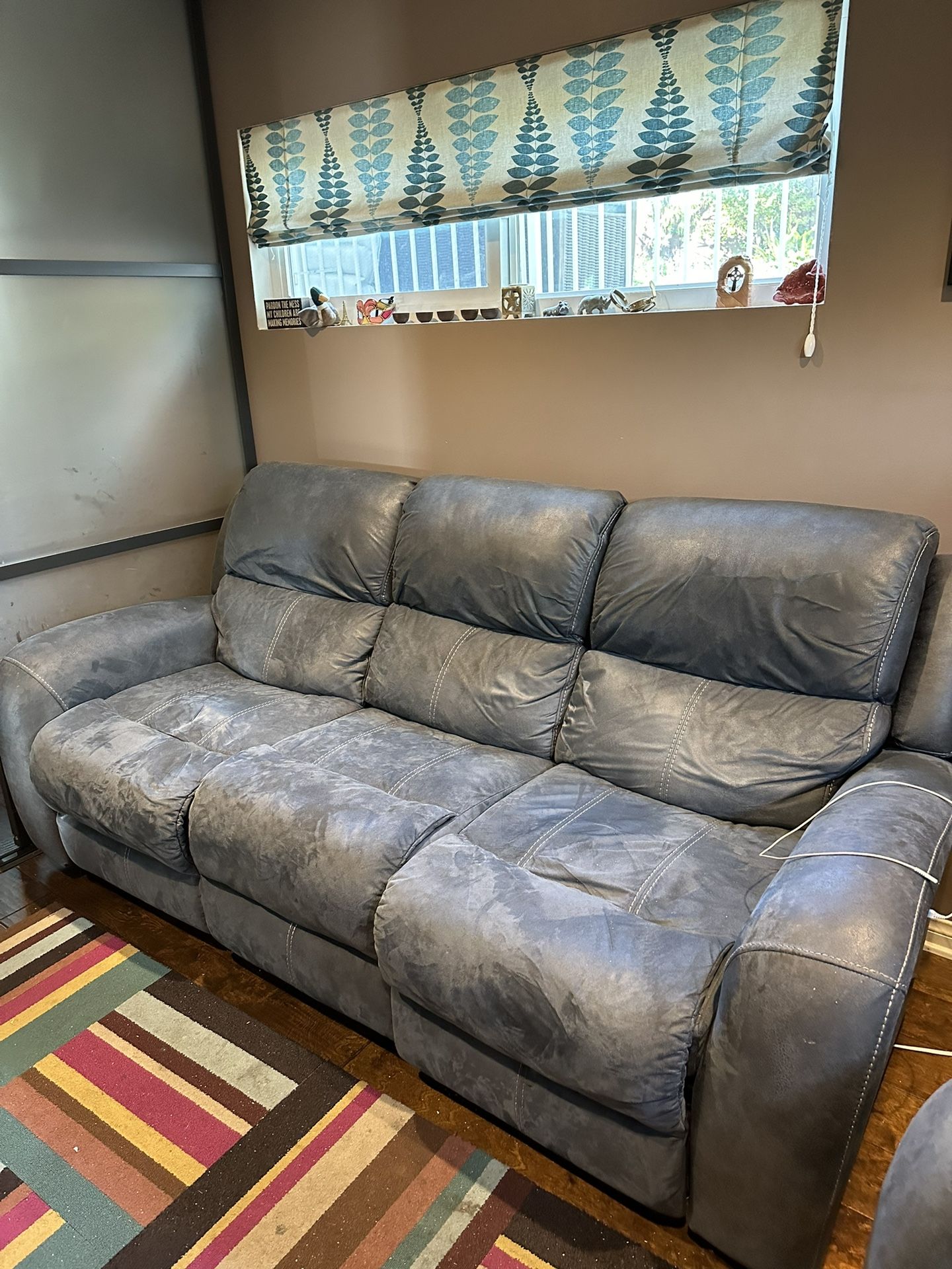 Reclining Leather Sofa And Loveseat $200