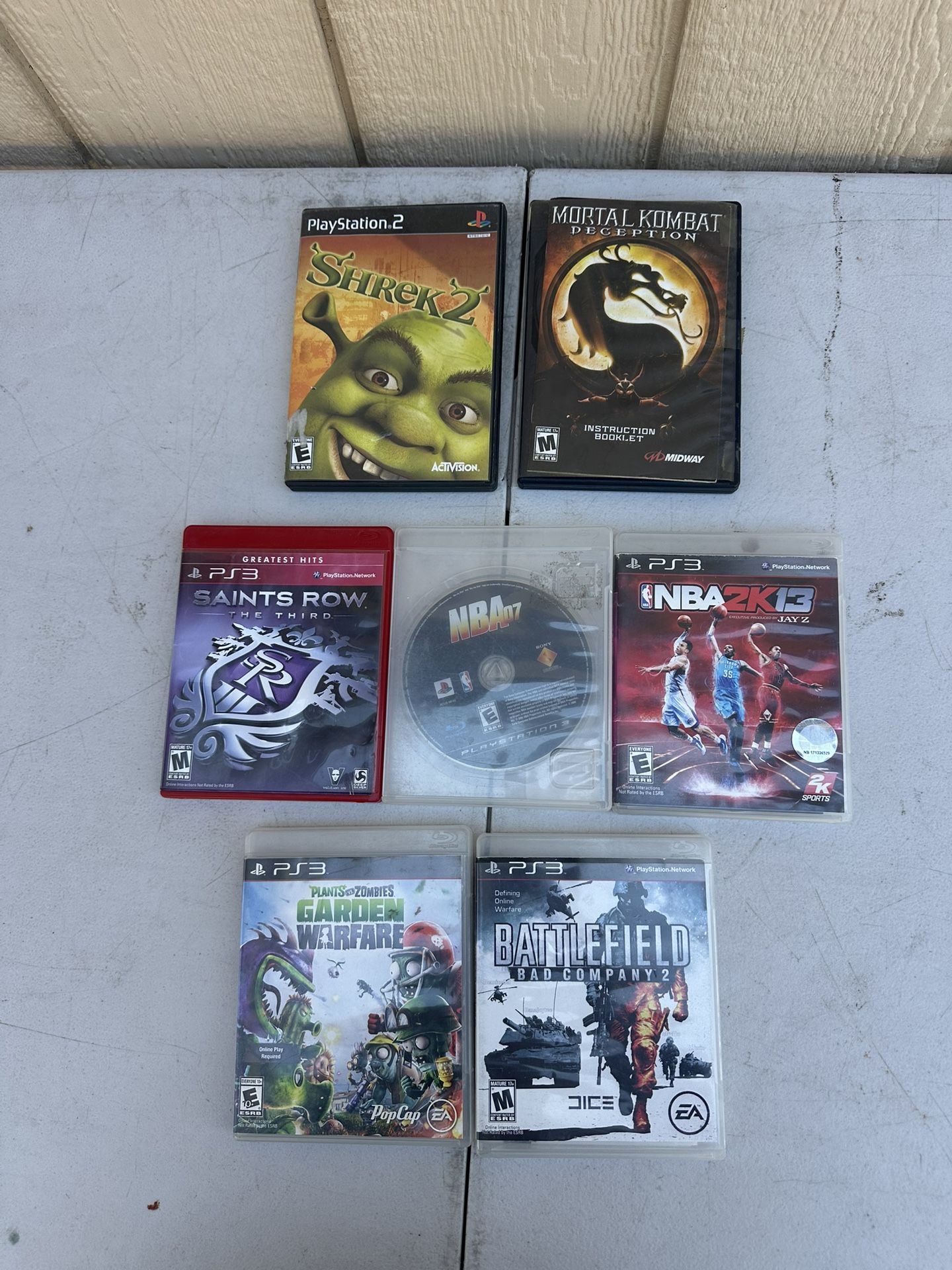 Lot Of 7 PlayStation 2 And Ps3 Video Games, NBA 2K12, Plants vs. Zombies, Battle
