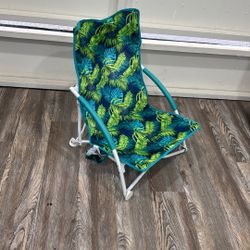 Mainstays Folding Low Seat Soft Arm Beach Bag Chair with a green palm patter