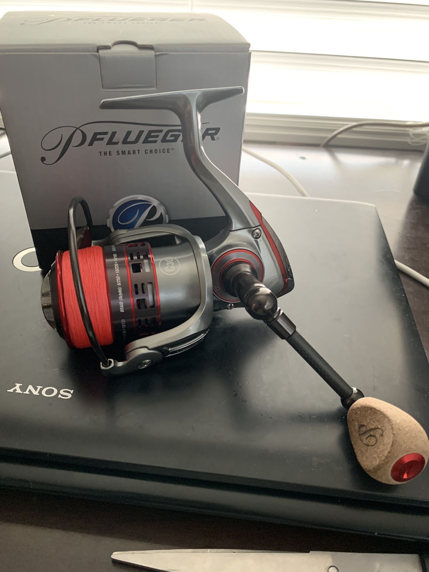Brand new Pflueger president XTSP35 fishing reel with 15 lb braided line