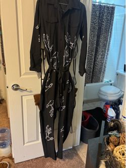 Unique jumper with hands printed across it