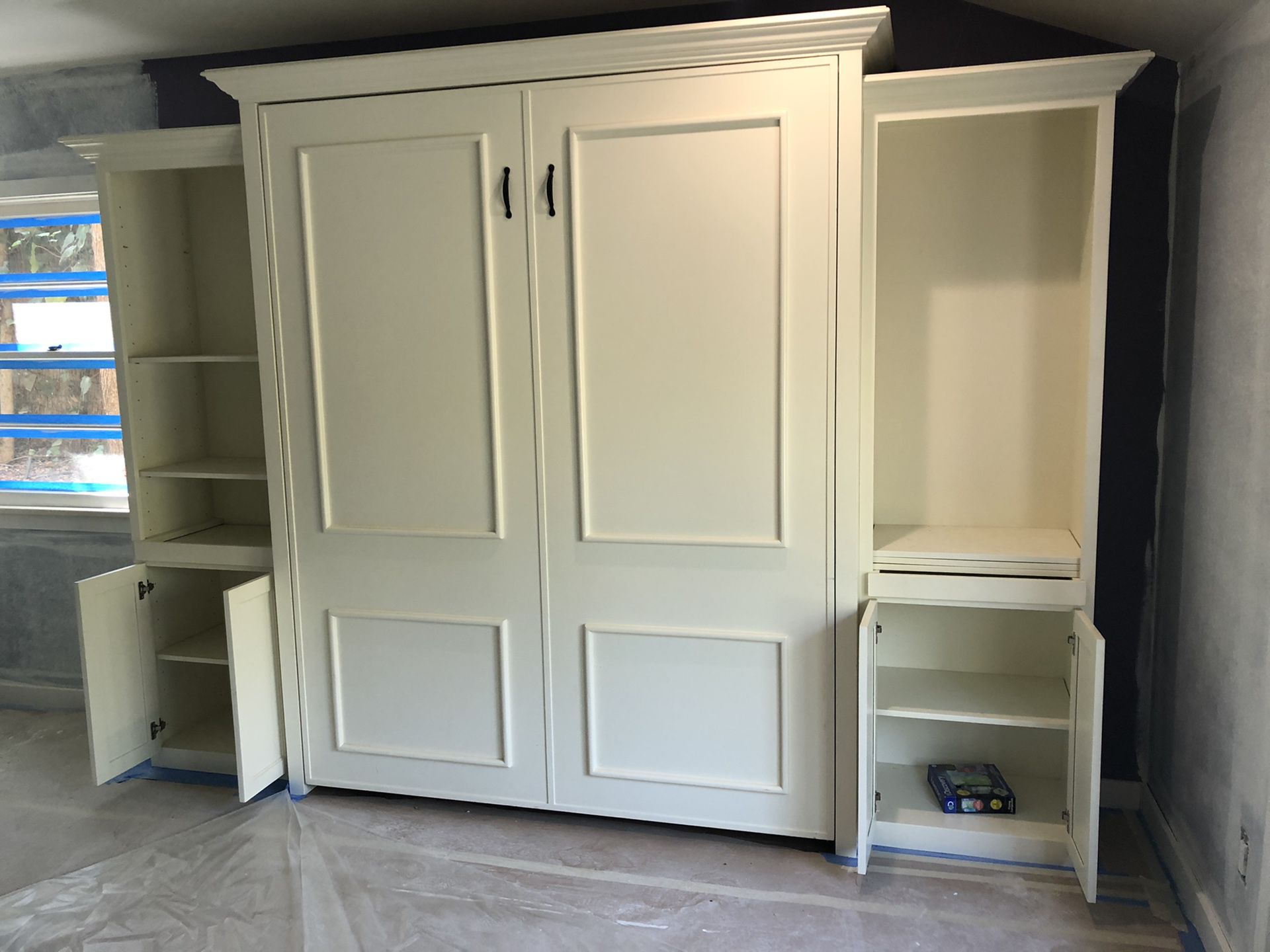 Murphy Bed with cabinets and bookshelves