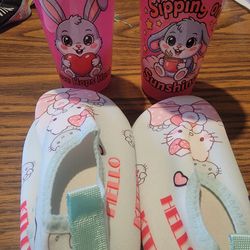 Sipping cups and beach shoes see description