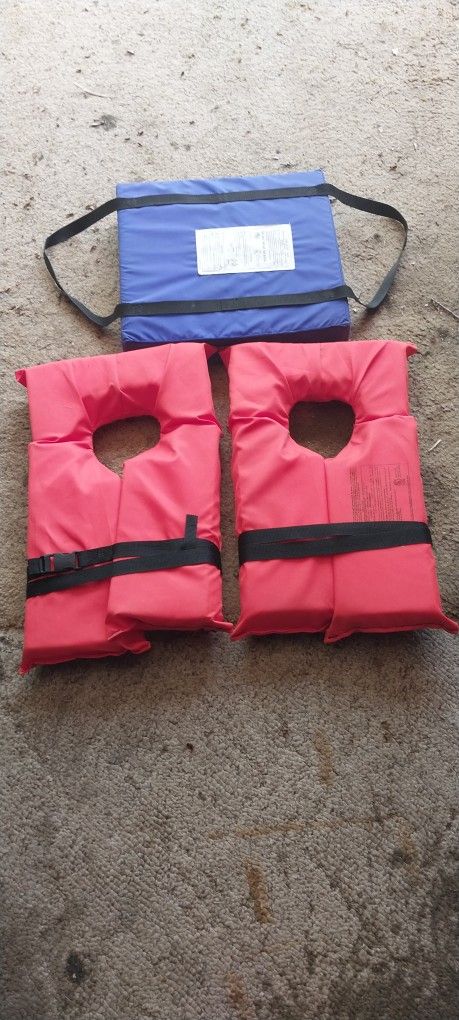 Life Vest New. 2 & Cushion 30.00 All