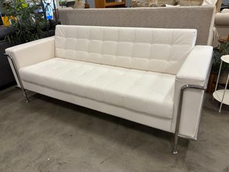 Modern Tufted Ivory Leather Sofa with Decorative Silver Encasement
