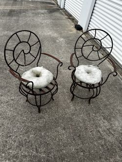 Heavy iron, rustic antique chairs