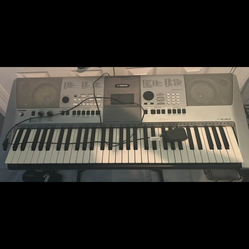 Yamaha electric keyboard with stand