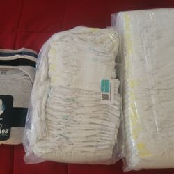 Pampers Newborn Diapers/ Onsies 0-3 Months