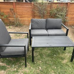 Outdoor patio chairs and table