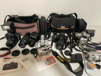 Lot of film,digital,video cameras-lenses-tripods