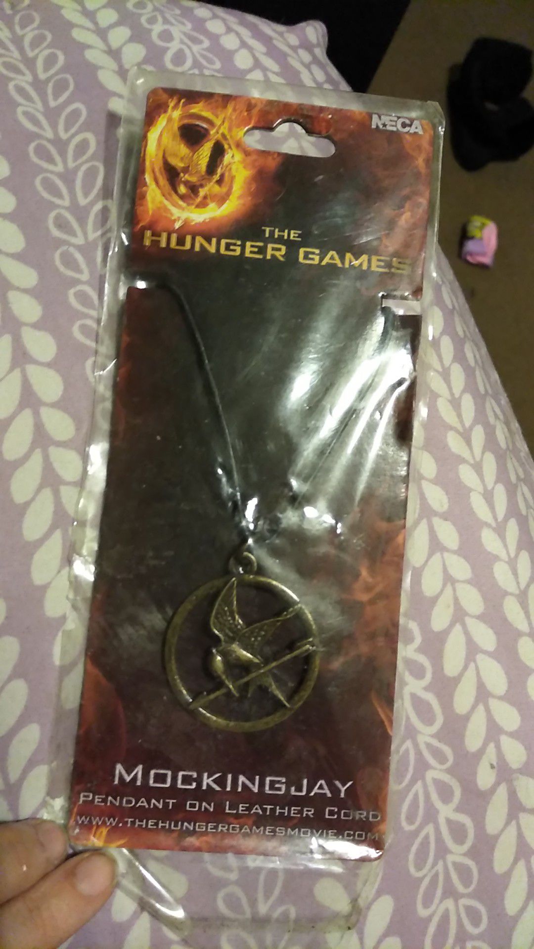 Free hunger games necklace