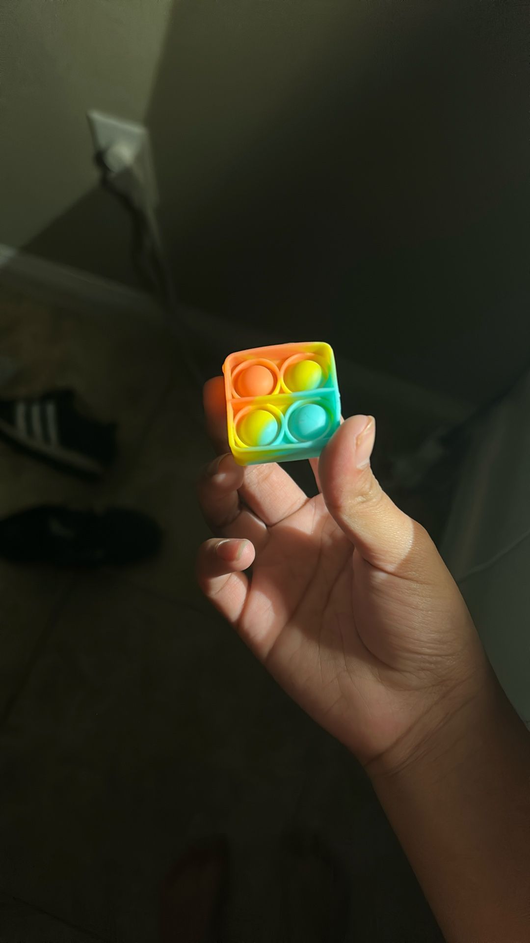 Pop It Toy And The Color Is Yellow Orange And Blue