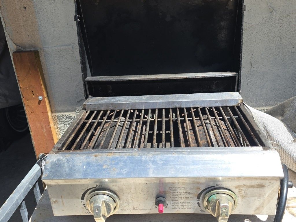 BBQ GRILL. SUITCASE STYLE works.