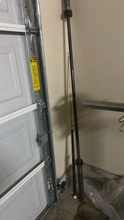 Cap plates with Olympic barbell