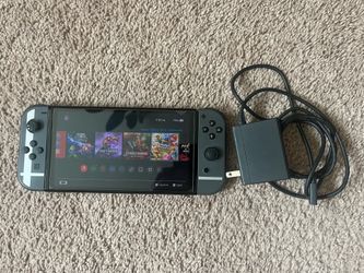 Mod-ded Nintendo Switch OLED with 512GB Micro SD Card and 25 Games