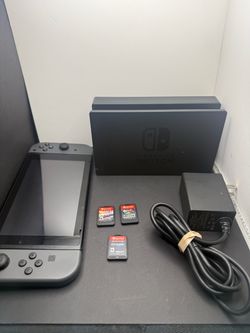 Switch with games $160