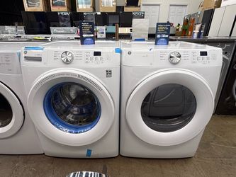 Brand new GE white front load washer and gas dryer set
