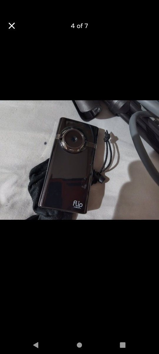 Flip Cam, Watches, Jabra bluetooth headset, & junk cables!