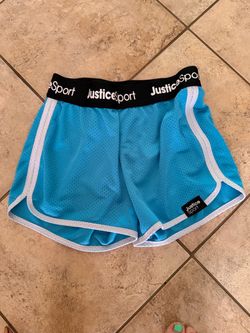 Girl’s justice sport blue athletic shorts. Size 12/14