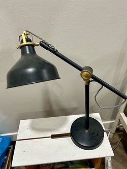 Ikea black desk lamp with gold accent
