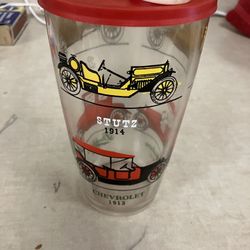 vintage Hazel Atlas glass cocktail shaker featuring antique car designs