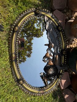 Oval mirror selling as is